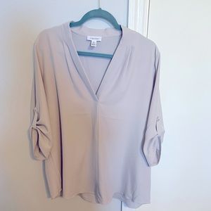 Light grey Calvin Klein dress shirt. Perfect for the office. Doesn’t wrinkle.